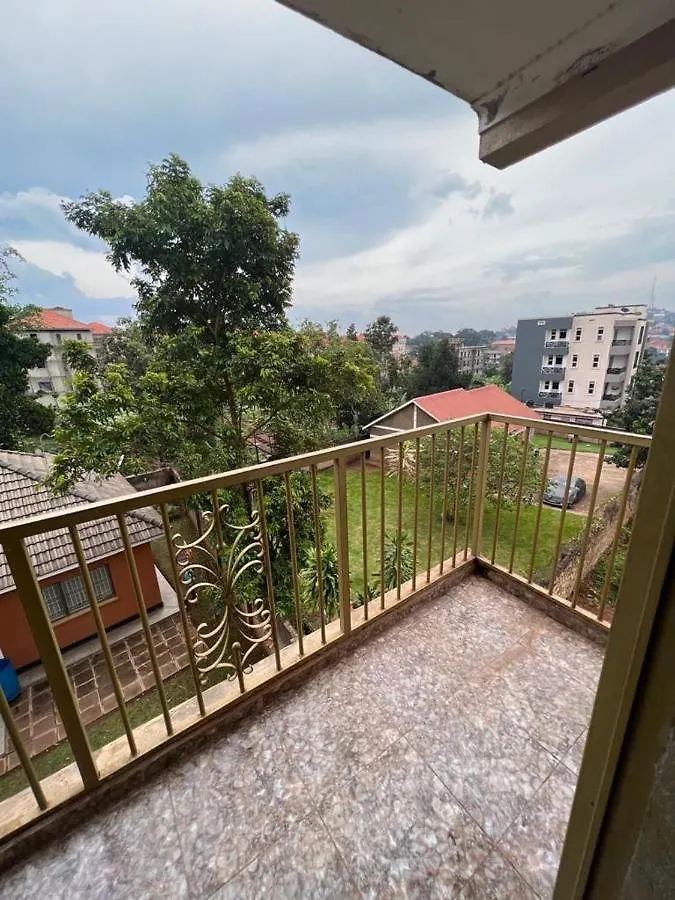 Cozy Suites Kampala Appartement